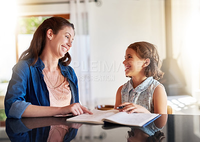 Buy stock photo Mother, child and notebook in apartment for learning, education and connection in family home. Happiness, woman and young girl in dining room for development, knowledge and studying for test with mom