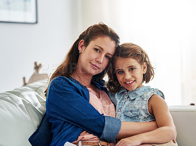 Buy stock photo Portrait of a mother and daughter spending some quality time together at home
