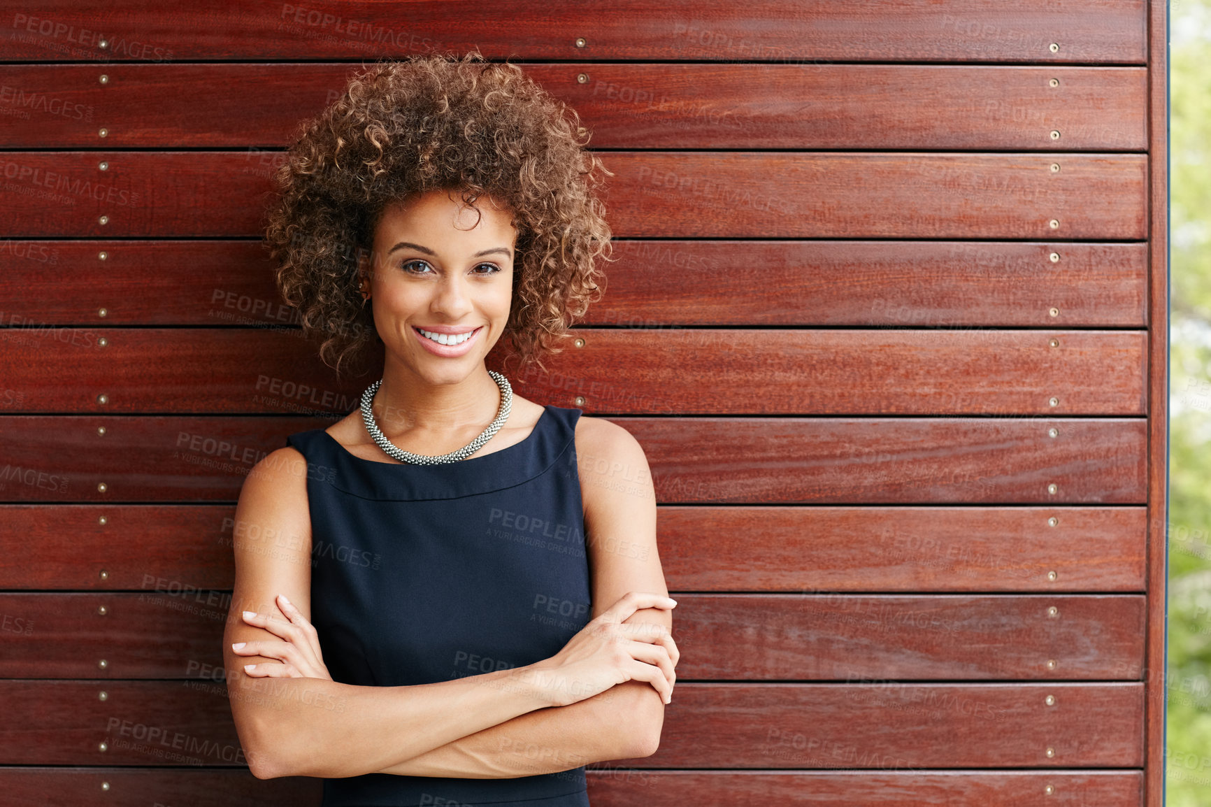 Buy stock photo Portrait of a confident young businessman standing outside