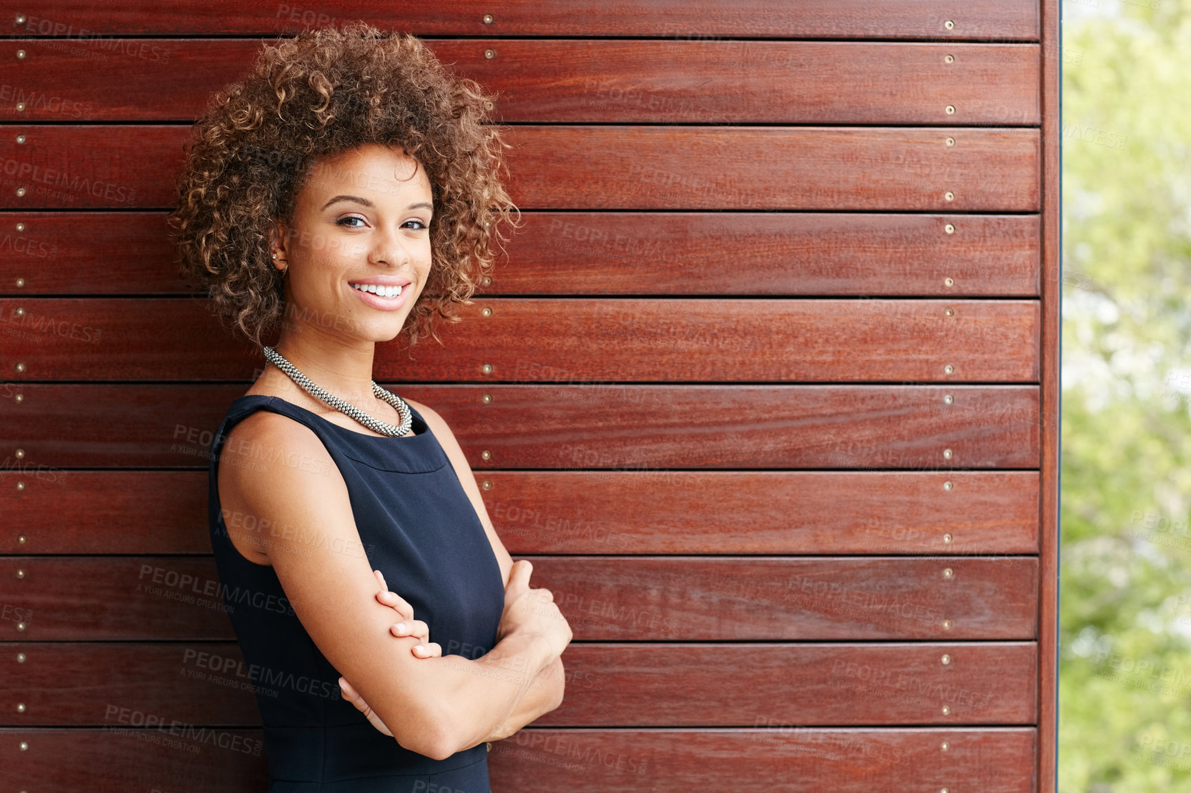 Buy stock photo Portrait of a confident young businessman standing outside