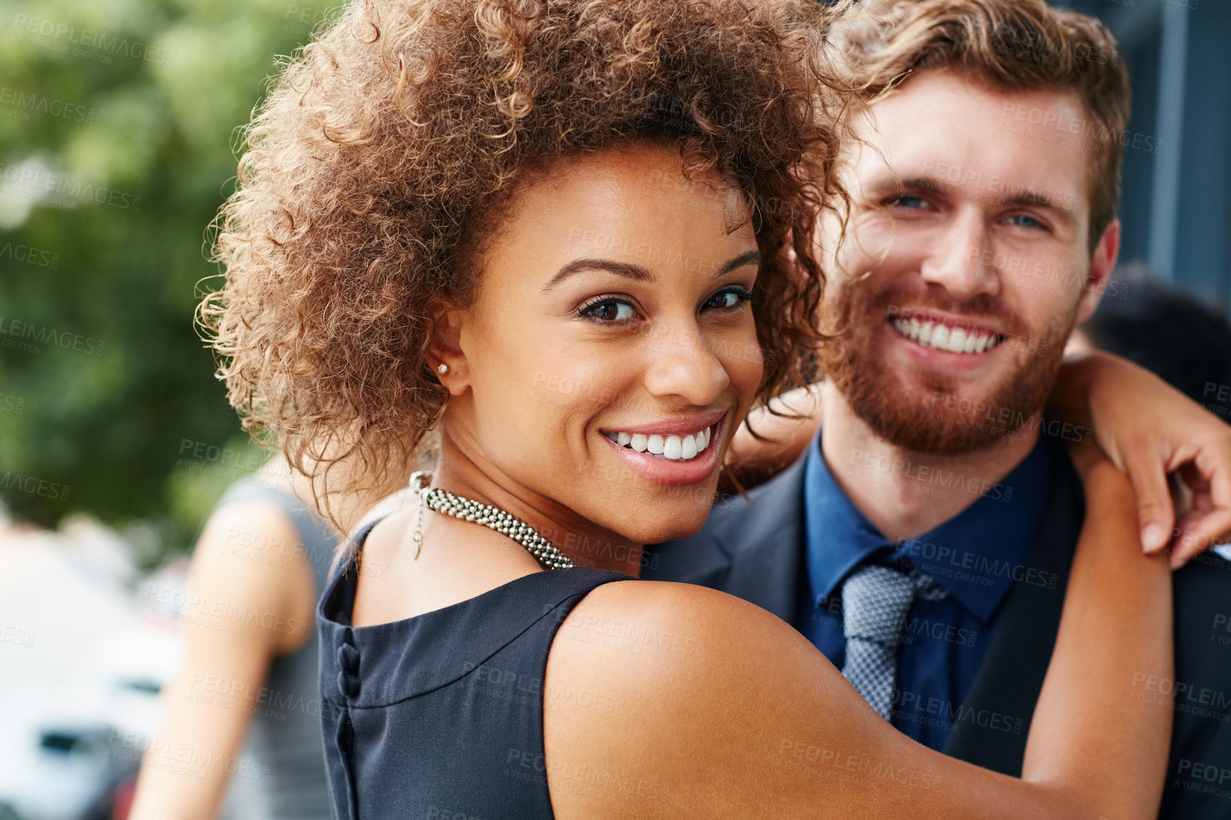 Buy stock photo Portrait of a businesswoman hugging a businessman outside