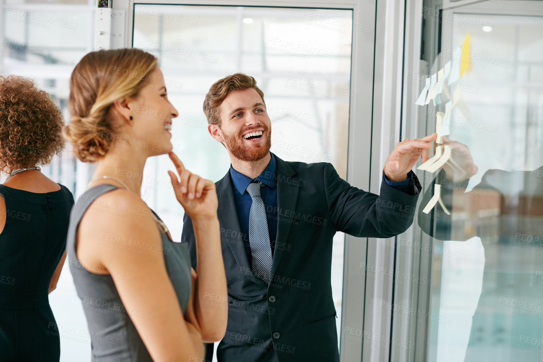 Buy stock photo Glass wall, smile and business people with brainstorming, teamwork and positive feedback in meeting. Collaboration, happy employees and project with staff, support and sticky note for review or ideas