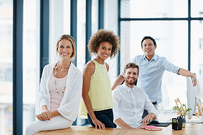 Buy stock photo Portrait of a group of businesspeople standing together in their office