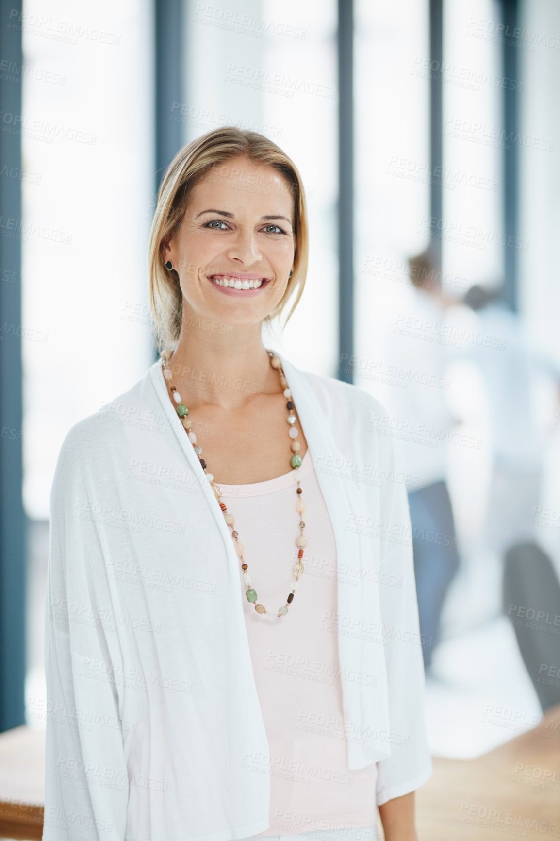 Buy stock photo Portrait of a happy businesswoman in her office