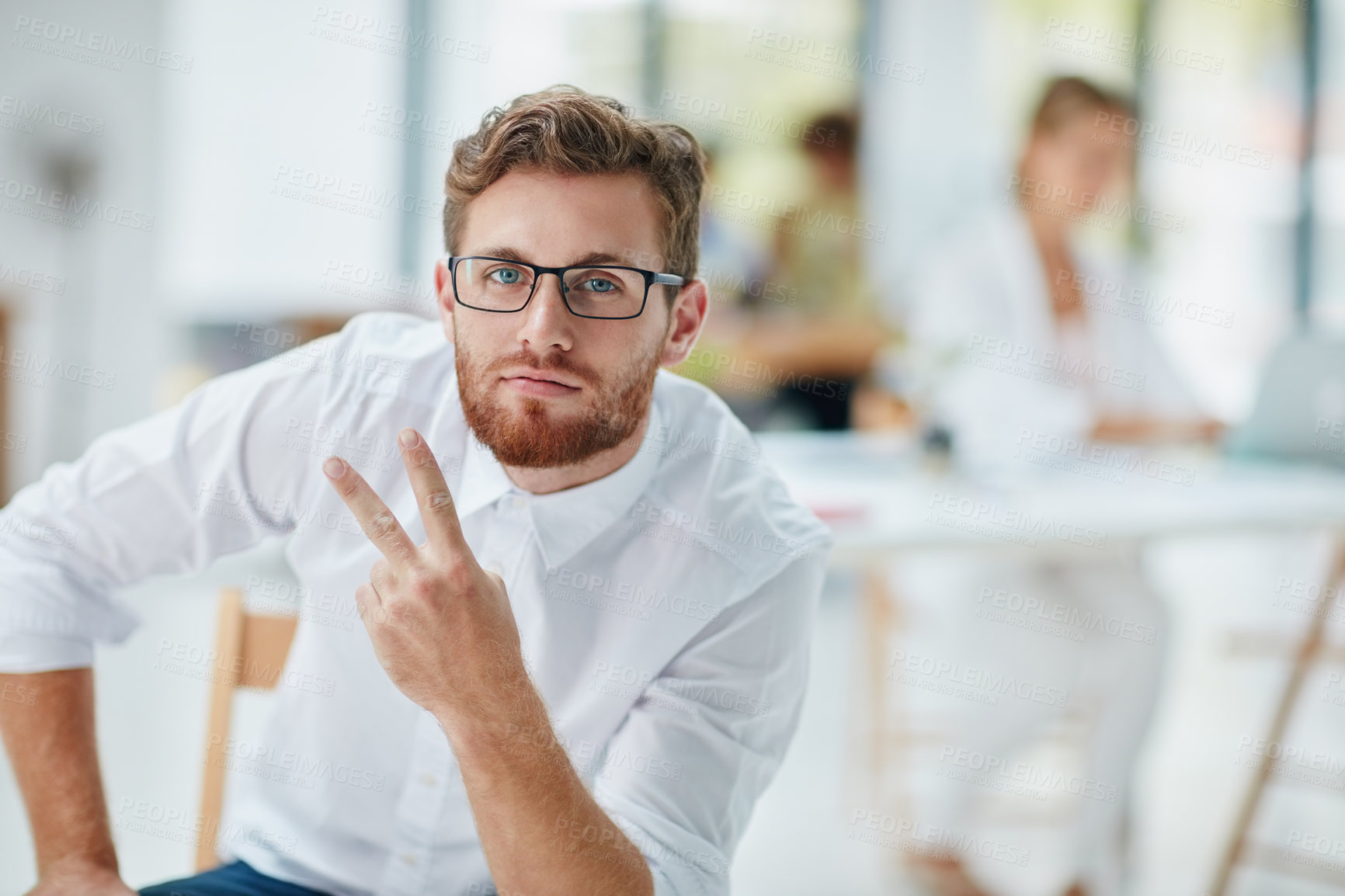 Buy stock photo Portrait of a businessman making a hand gesture in the office