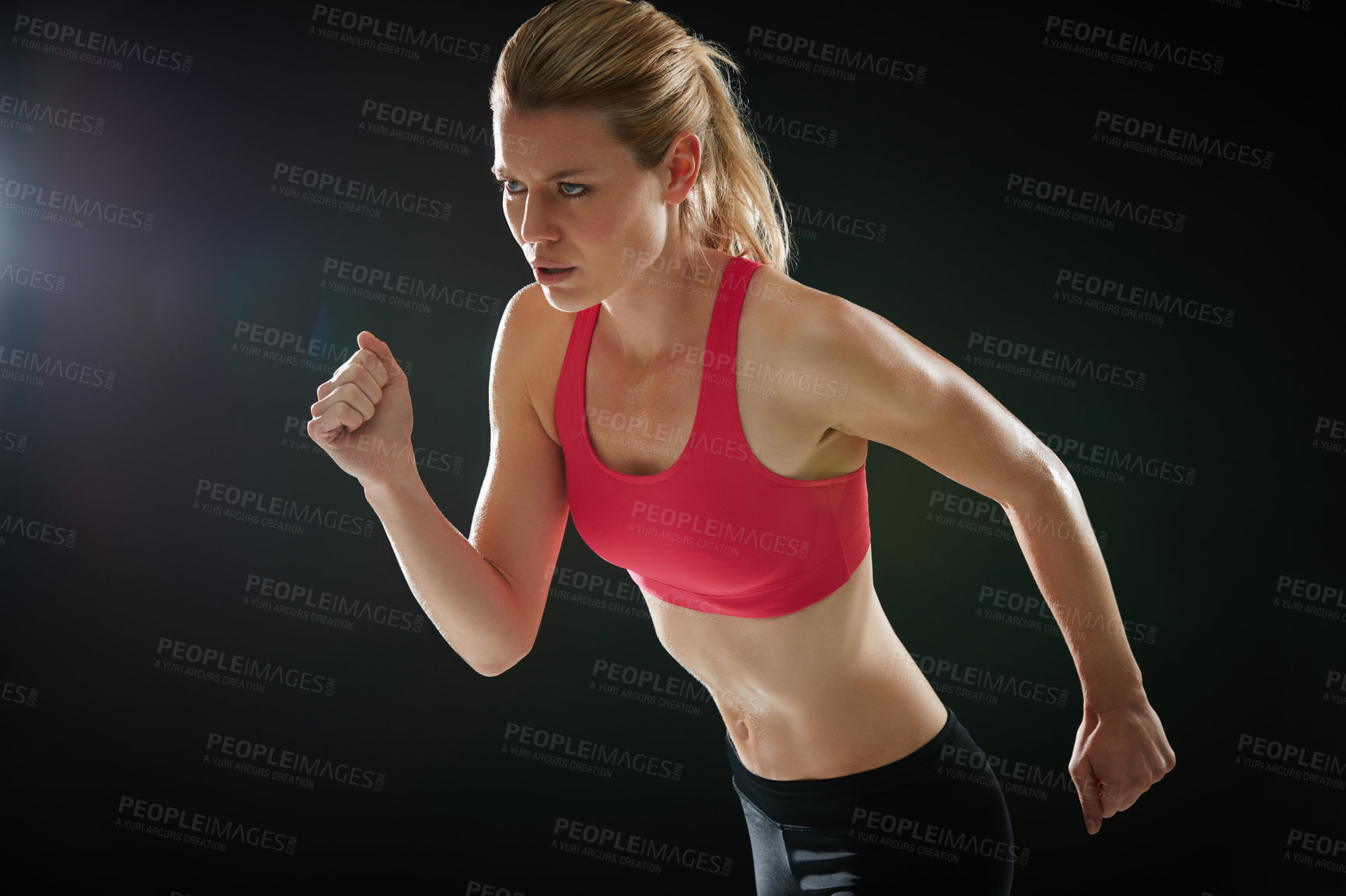 Buy stock photo Cropped shot of an attractive young female sprinter