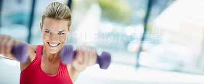 Buy stock photo Cropped portrait of an attractive young woman working out with dumbbells