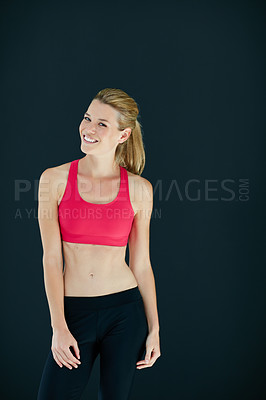 Buy stock photo Cropped portrait of an attractive young woman in workout attire