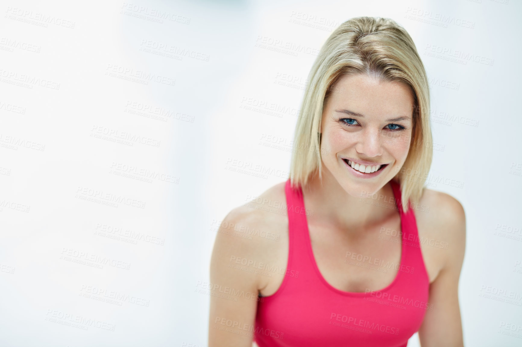 Buy stock photo Cropped portrait of an attractive young woman in workout attire