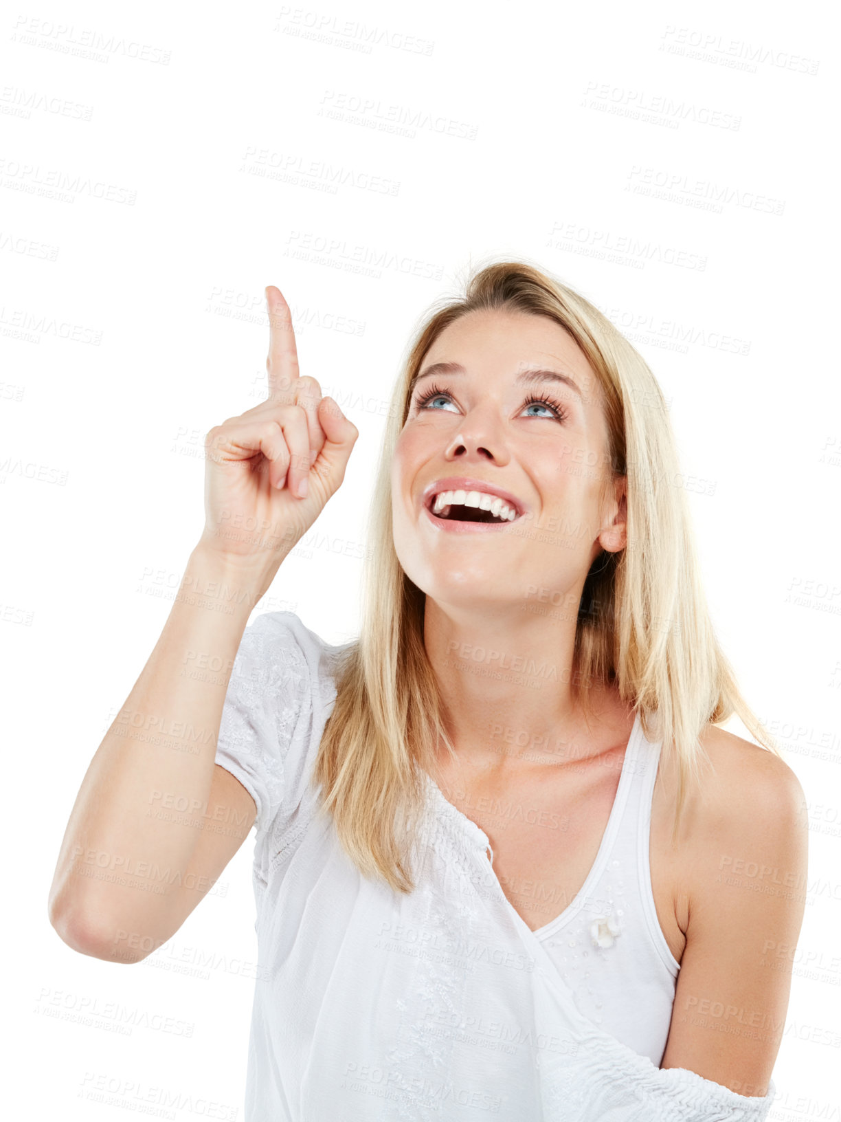 Buy stock photo Studio shot of an amazed young woman pointing at copyspace against a white background