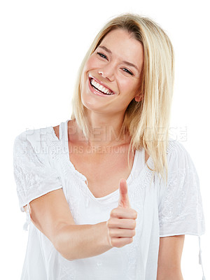 Buy stock photo Studio portrait of an attractive young woman giving thumbs up against a white background