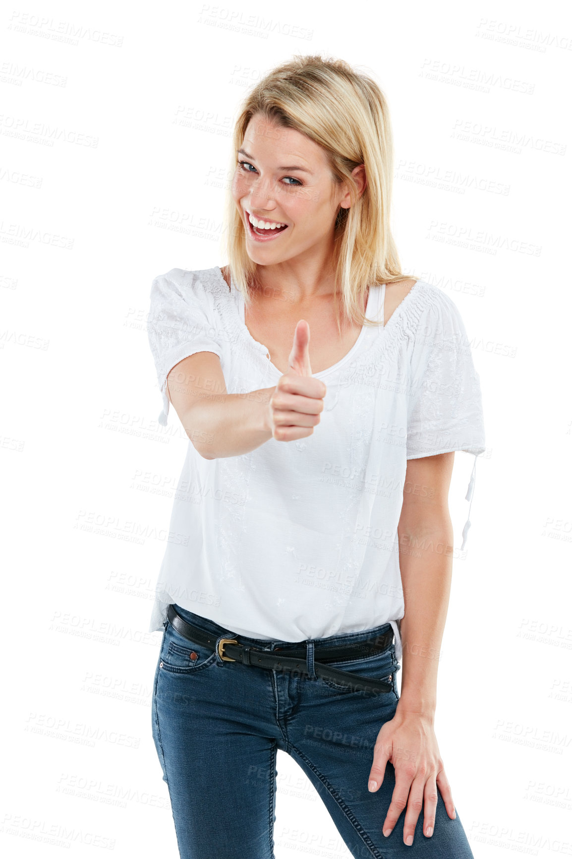 Buy stock photo Studio portrait of an attractive young woman giving thumbs up against a white background