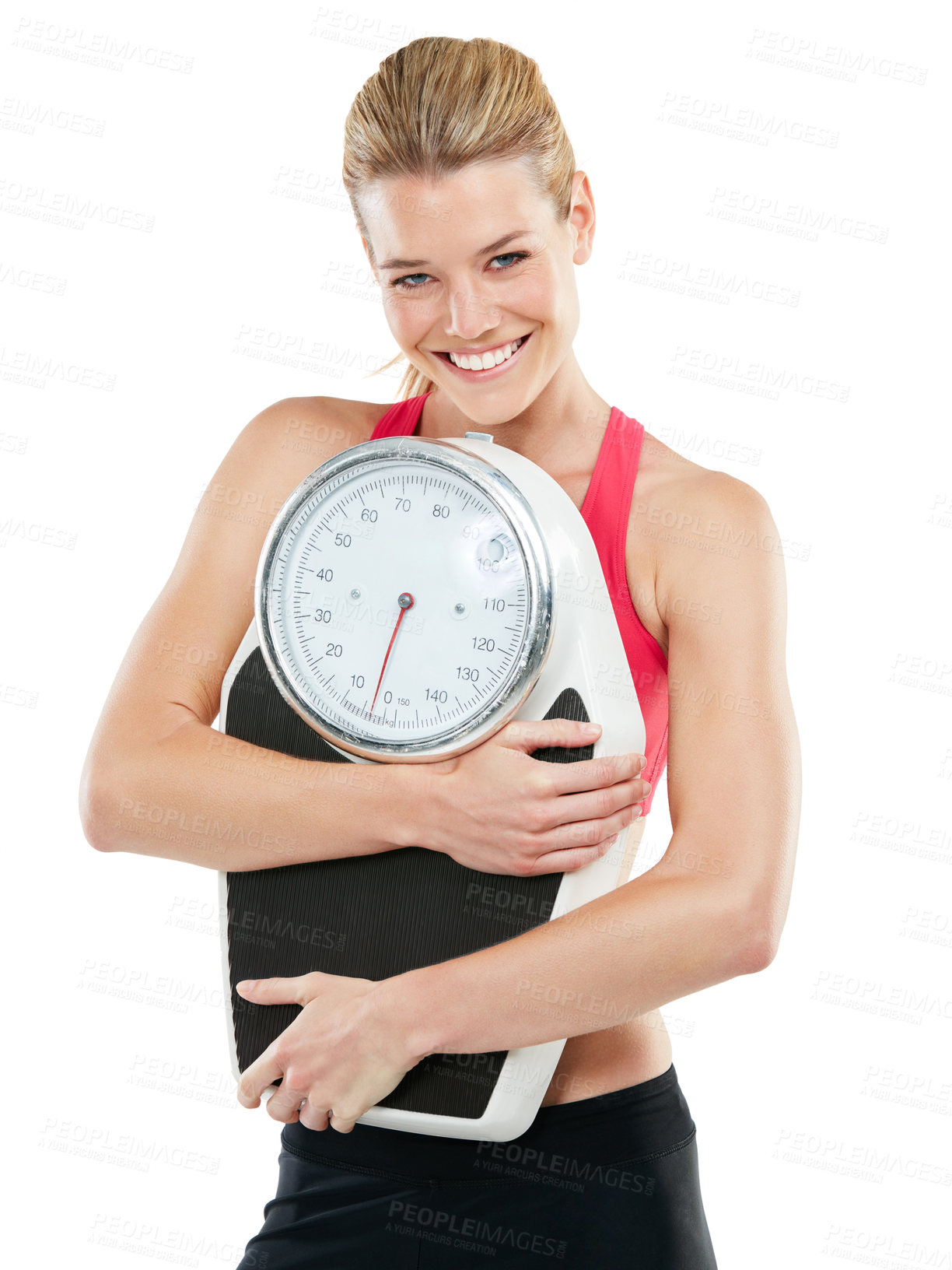 Buy stock photo Studio shot of an athletic young woman holding a scale