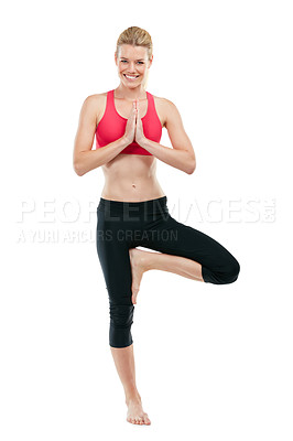 Buy stock photo Portrait of a young woman doing yoga against a white background