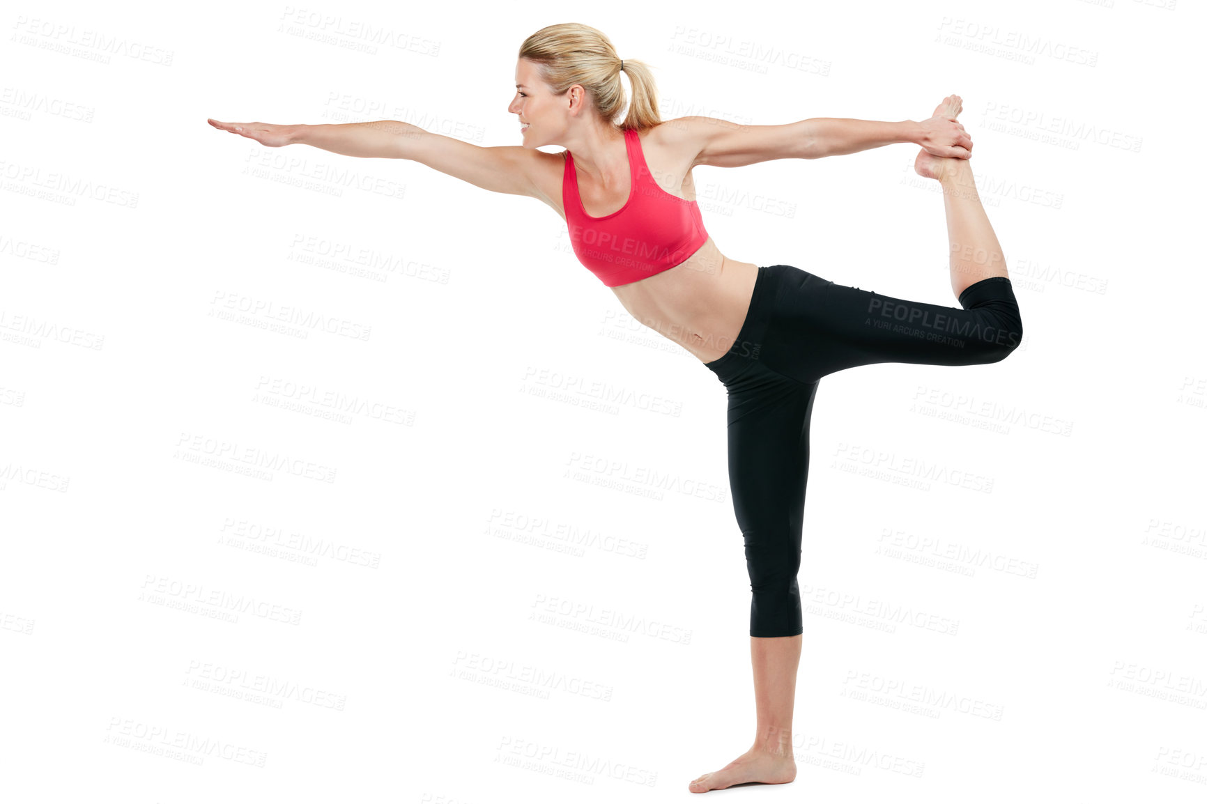 Buy stock photo Studio shot of a young woman doing stretch exercises