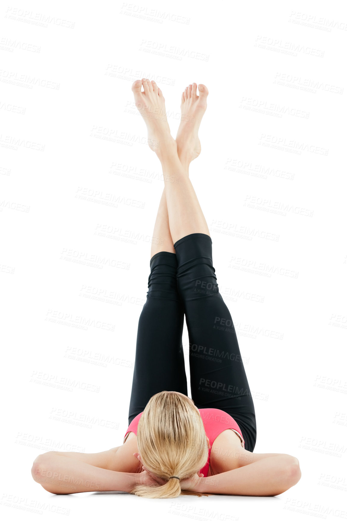 Buy stock photo Studio shot of a young woman lying on the floor