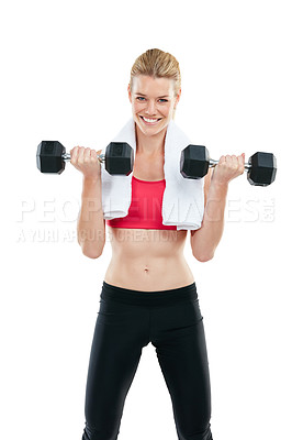 Buy stock photo Studio shot of a young woman lifting weights