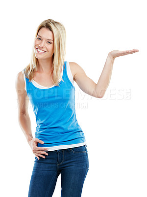 Buy stock photo Studio shot of an attractive young woman presenting copyspace