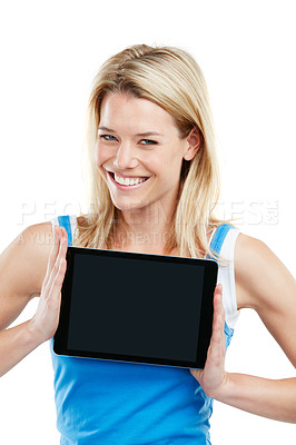 Buy stock photo Shot of a young woman holding a digital tablet against a white background