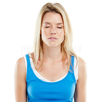 Buy stock photo Studio shot of a young woman looking drained