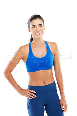 Buy stock photo Portrait of a sporty young woman standing against a white background
