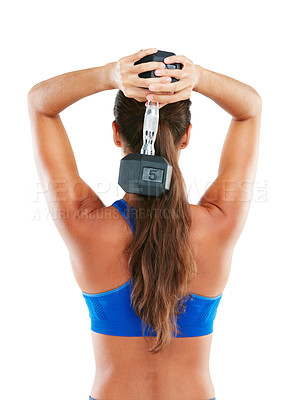 Buy stock photo Rearview shot of a young woman working out with dumbbells against a white background