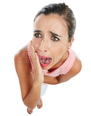 Buy stock photo Studio shot of a young woman looking scared against a white background