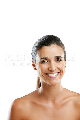 Buy stock photo Studio portrait of a beautiful young woman with a flawless complexion isolated on white