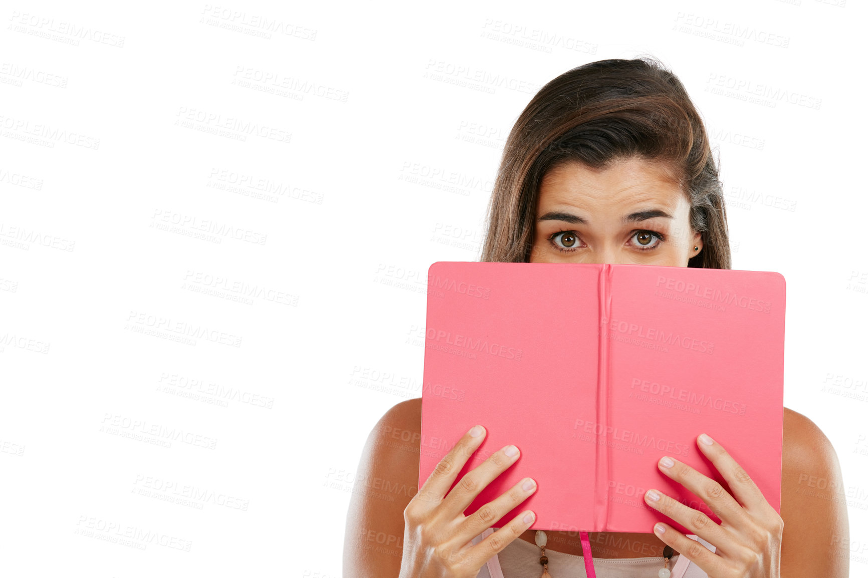 Buy stock photo Studio portrait of a young woman reading a book against a white background