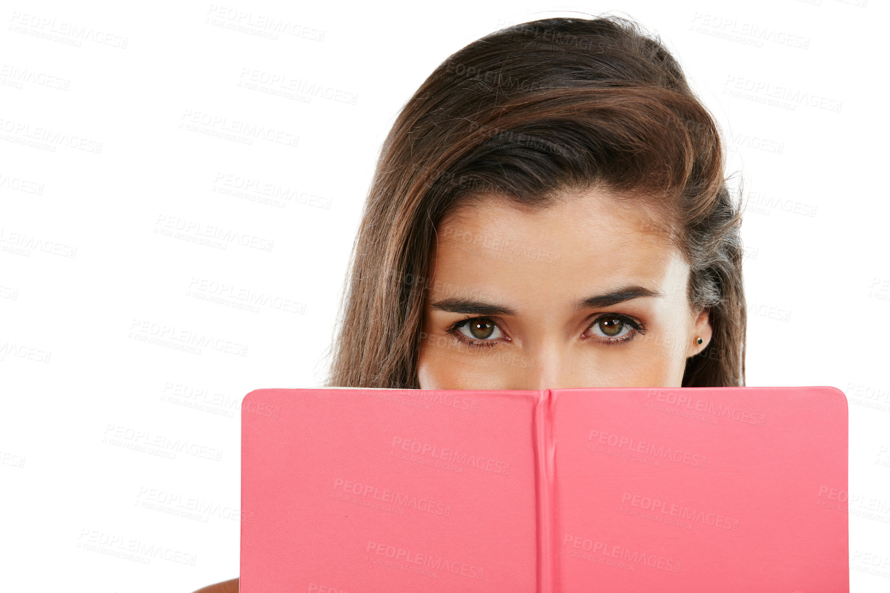 Buy stock photo Studio portrait of a young woman reading a book against a white background