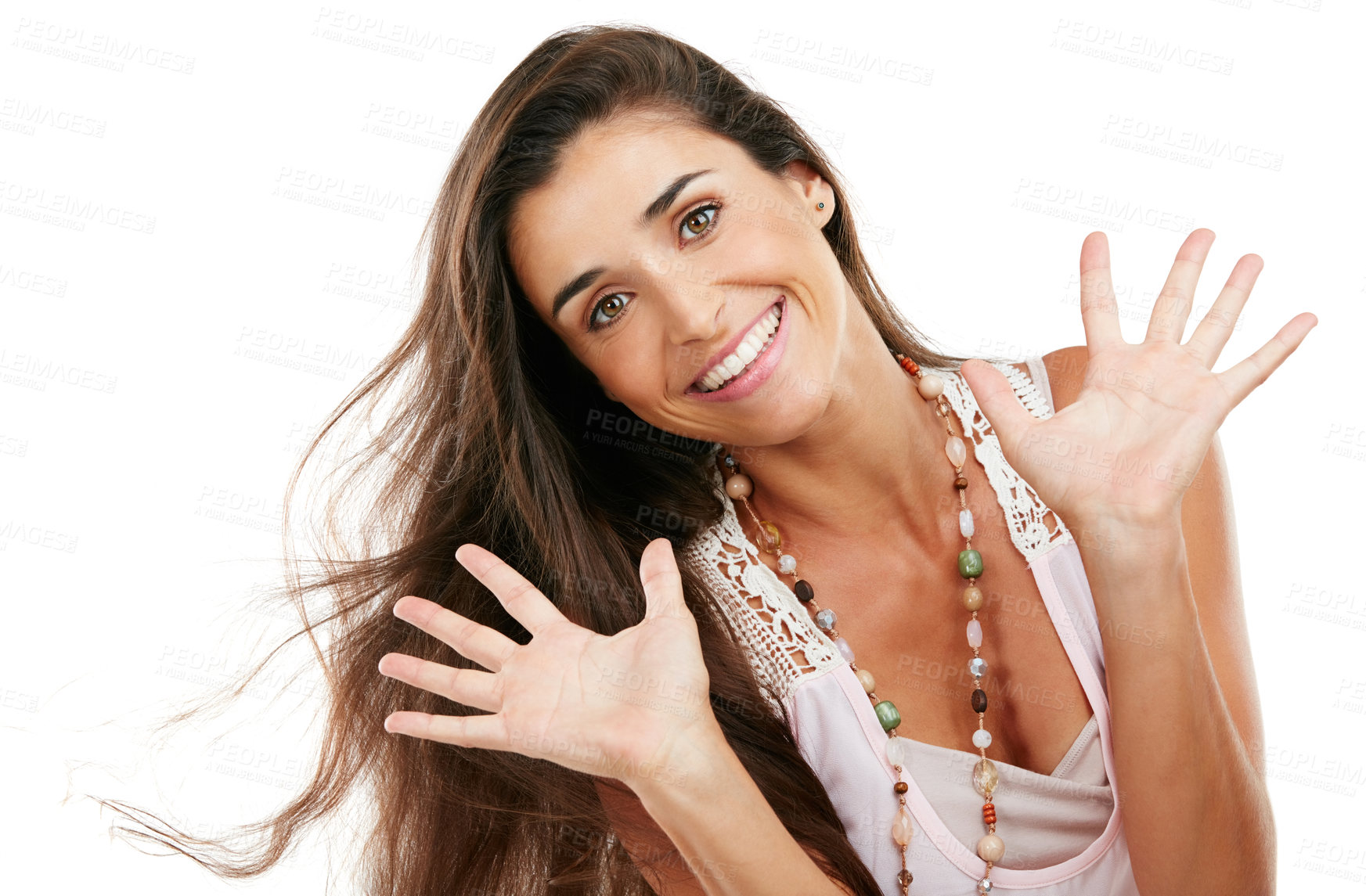 Buy stock photo Studio portrait of an attractive young woman waving her hands against a white background