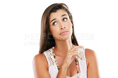 Buy stock photo Studio shot of a young woman looking unsure against a white background