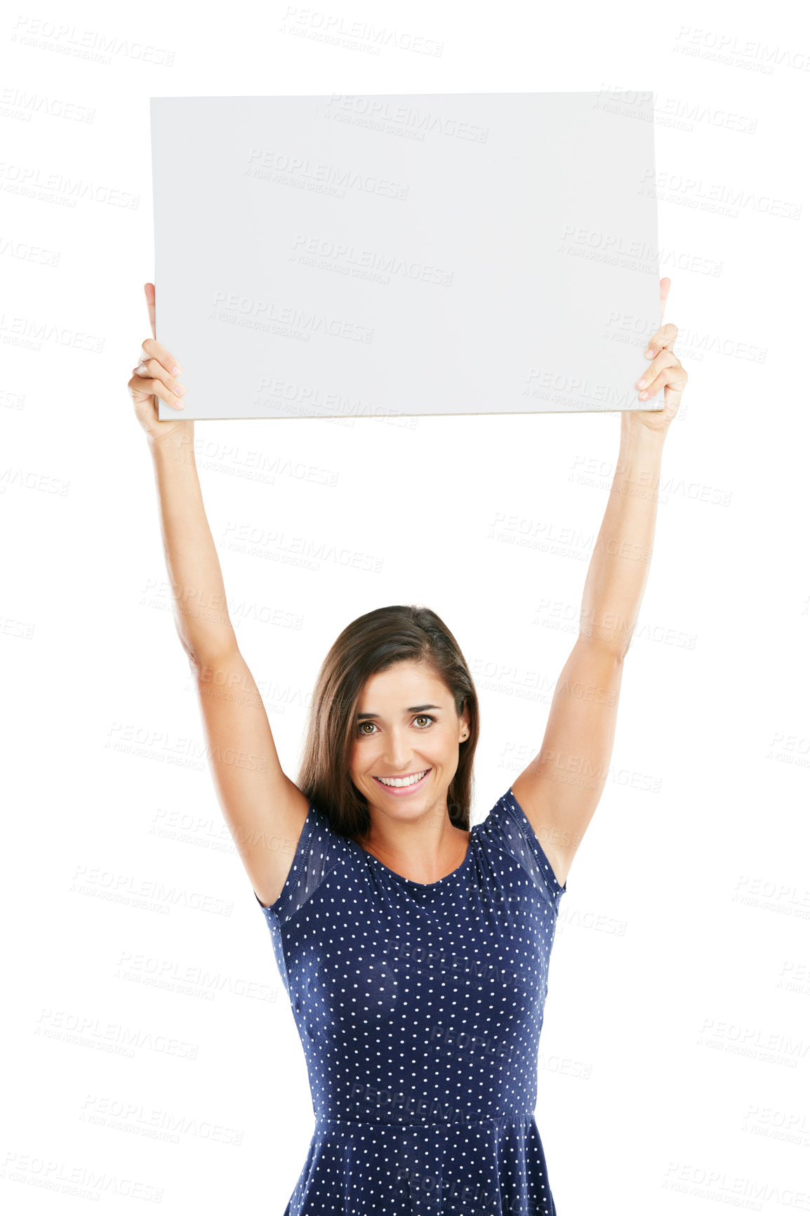 Buy stock photo Studio portrait of an attractive young woman holding up a blank placard against a white background