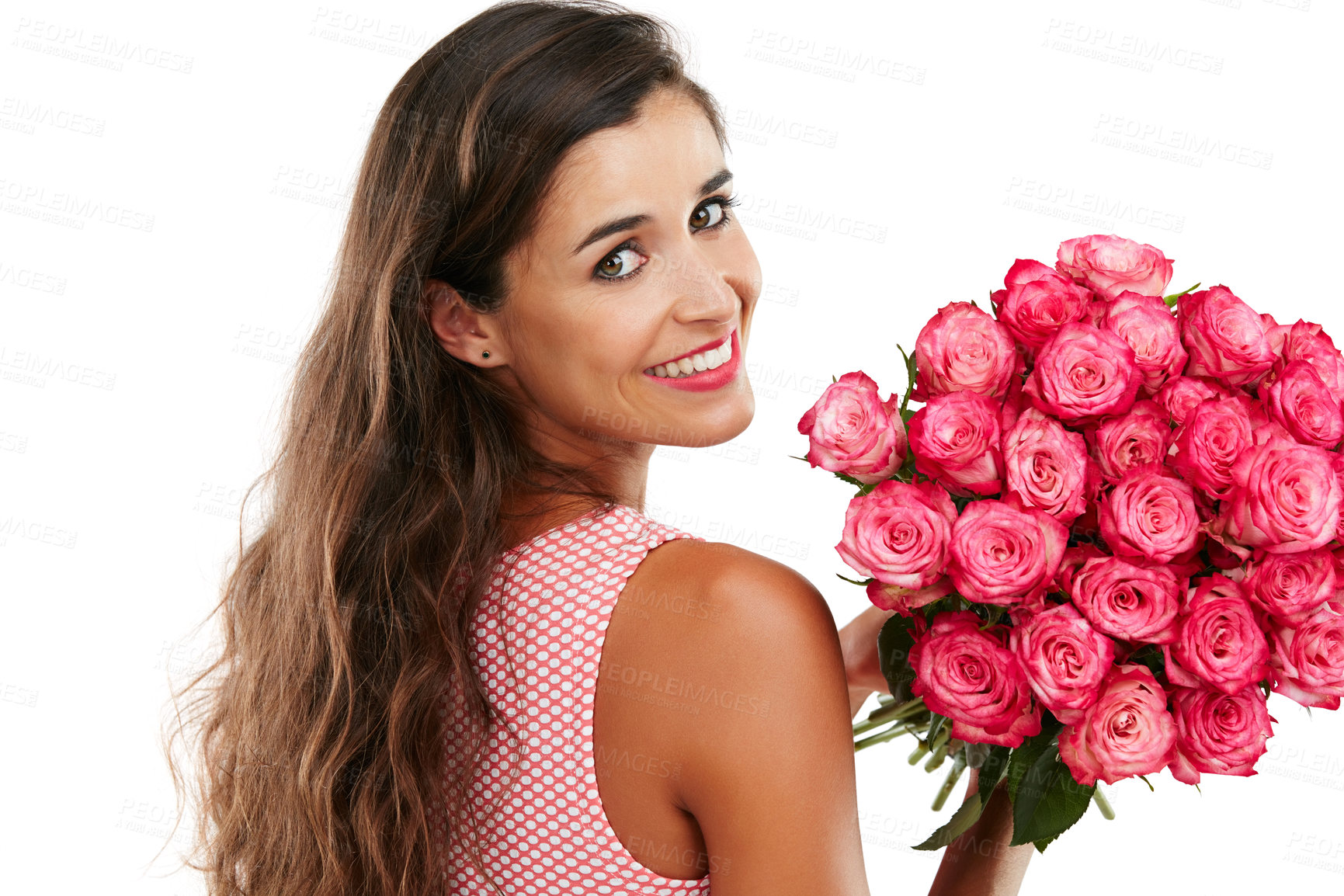 Buy stock photo Studio portrait of a happy young woman holding a bouquet of flowers against a white background