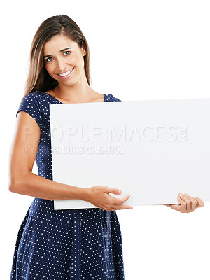 Buy stock photo Studio portrait of an attractive young woman holding a blank placard against a white background
