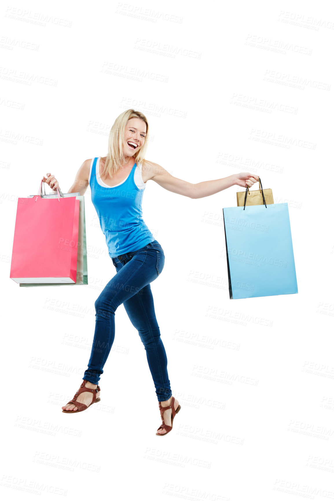 Buy stock photo Studio shot of an attractive young woman holding shopping bags