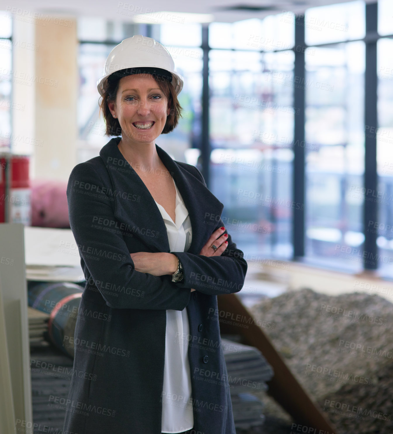 Buy stock photo Portrait of a female construction manager on site wearing a hardhat