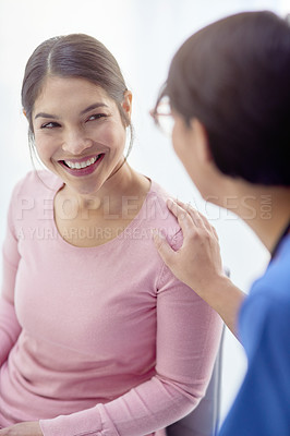 Buy stock photo Woman, smile and patient in clinic for consultation, appointment and healthcare for medical service. Female nurse, wellness and happiness in hospital for good news, wellbeing and support for results