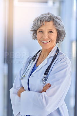 Buy stock photo Arms crossed, doctor and portrait with mature woman in hospital for healthcare or trust. Cardiology, smile for medical and happy medicine professional with stethoscope in health clinic for treatment