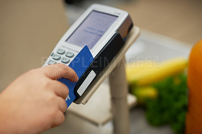 Buy stock photo Closeup shot of a credit card payment being made in a grocery store