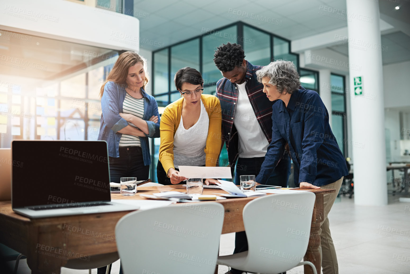 Buy stock photo Shot of a team of creative businesspeople brainstorming in the office