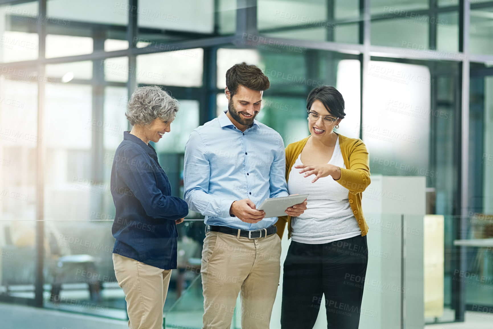 Buy stock photo Tablet, teamwork or editors talking in startup meeting for solution, conversation and work discussion. Support, happy and designers in office for planning, creative ideas and online collaboration