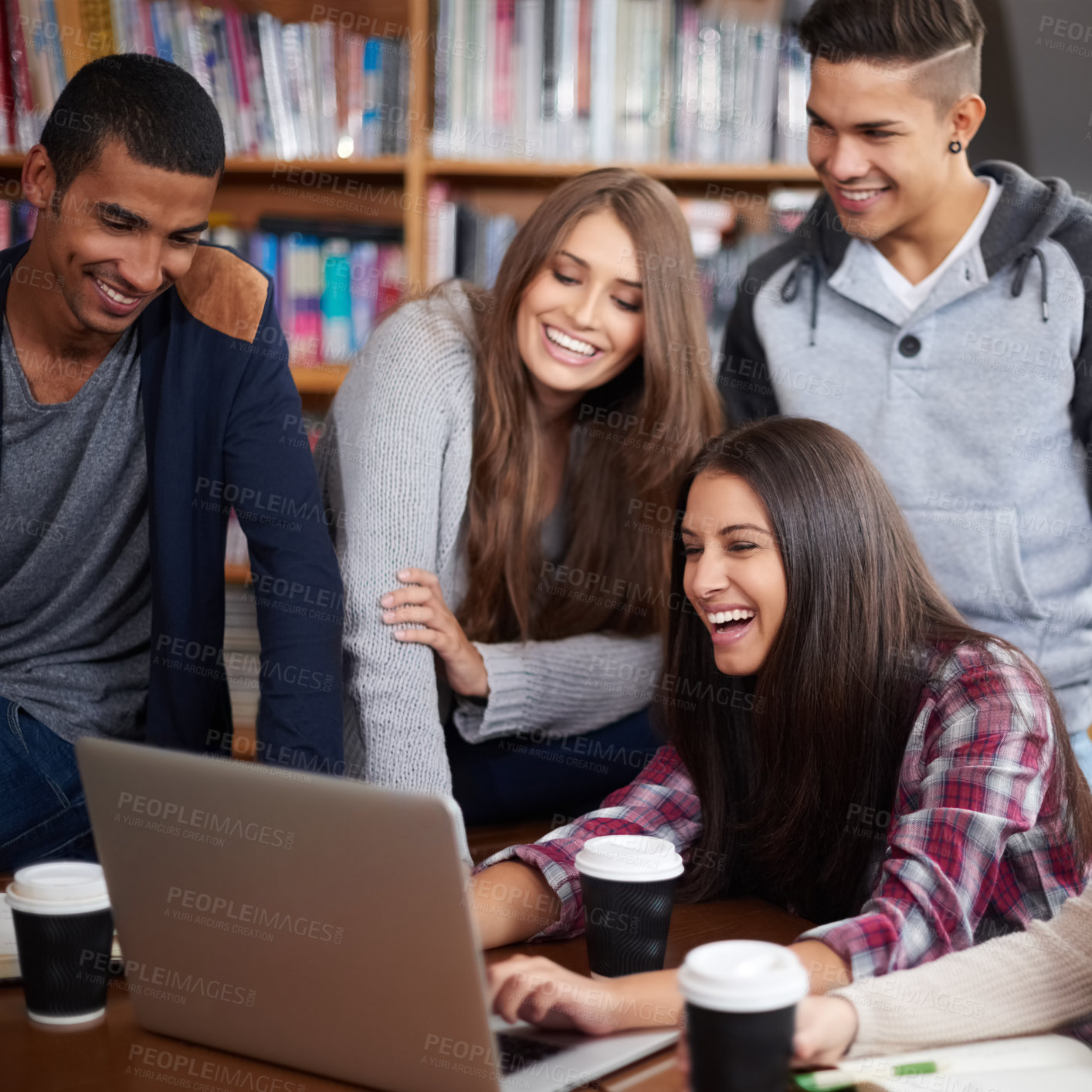 Buy stock photo Education, happy and people in library on laptop for social media, online learning and meme. University, diversity and happy men and women students on computer for knowledge, internet and website