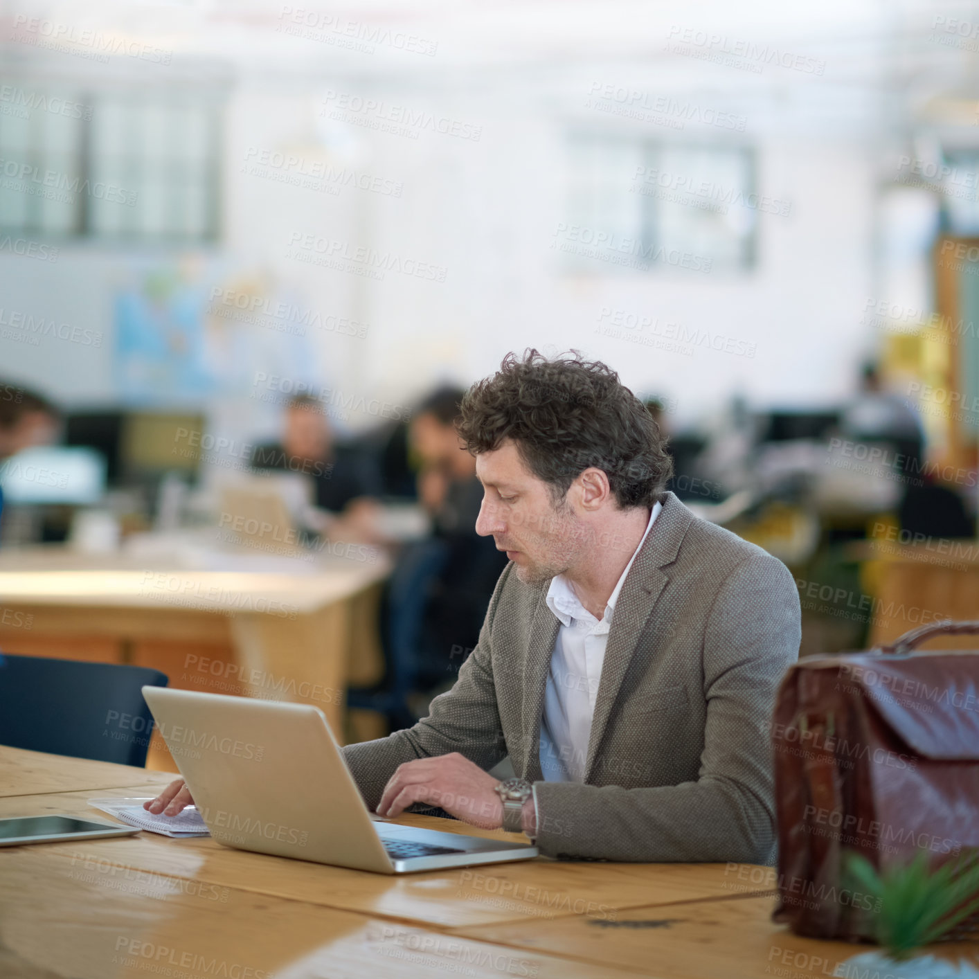 Buy stock photo Employee, auditor and man with laptop for working with report of stock market on desk of workplace. Office, staff and male person with briefcase, typing and budget of corporate company for economy