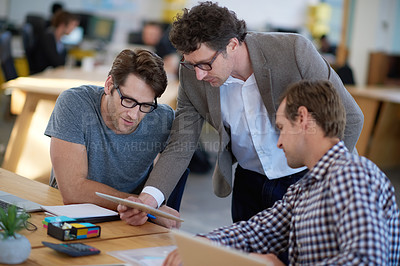 Buy stock photo Business people, discussion and tablet for collaboration on research, problem solving and teamwork. Men, partnership and together for planning in coworking office, brainstorming and conversation