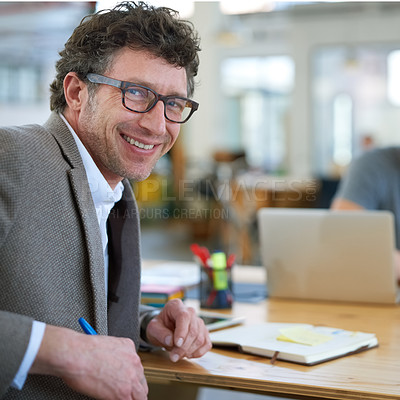 Buy stock photo Happy, portrait and creative man in office with notebook for planning project with on desk. Mature, employee and productivity in coworking collaboration, cooperation or writing ideas in schedule