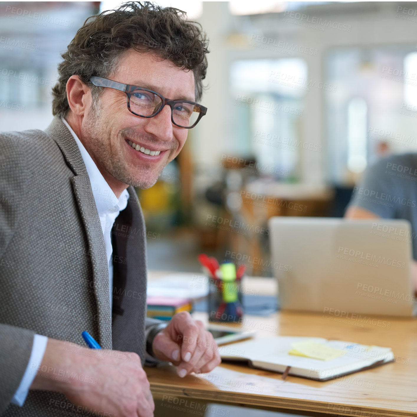 Buy stock photo Happy, portrait and creative man in office with notebook for planning project with on desk. Mature, employee and productivity in coworking collaboration, cooperation or writing ideas in schedule