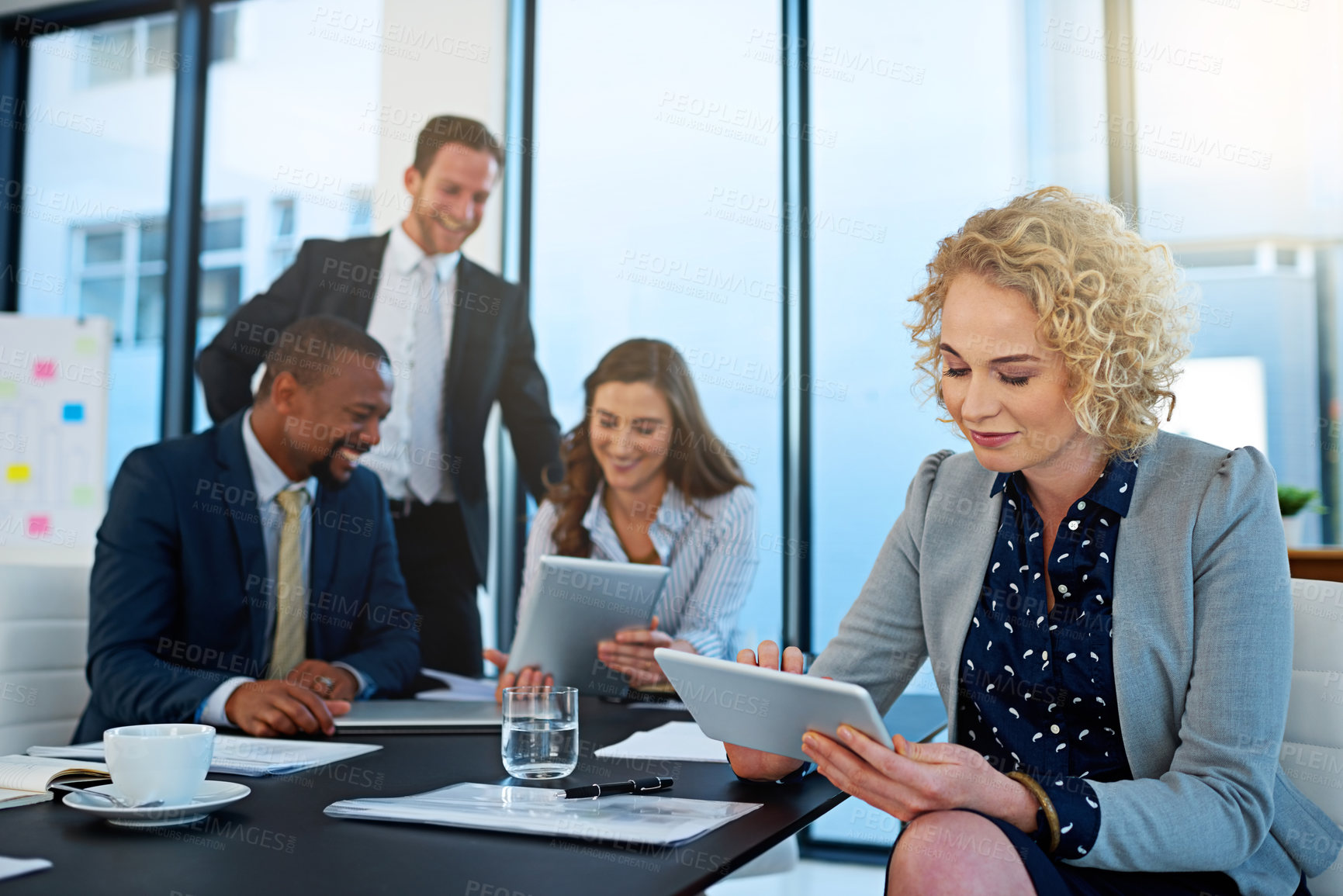 Buy stock photo Office, lawyer or businesswoman on tablet at law firm for consulting, legal research or corporate case. Staff meeting, boardroom or attorney on technology for schedule update, news or feedback review