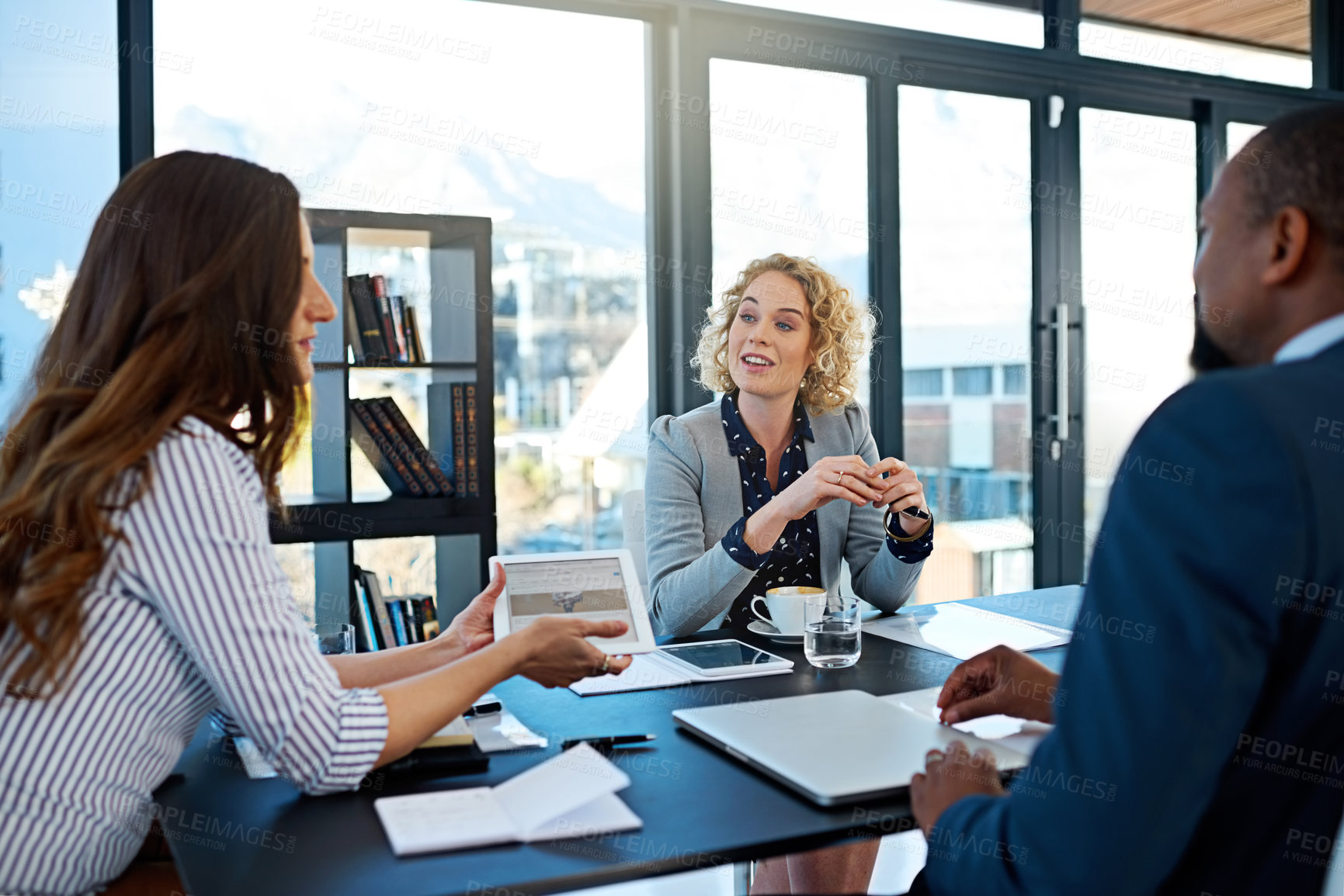 Buy stock photo Business people, boardroom and tablet for talk on plan, teamwork and problem solving. Employees, speaking and office for collaboration at global training research and meeting for project proposal