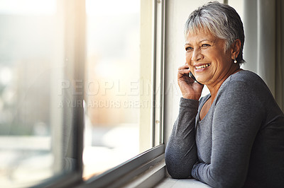 Buy stock photo Phone call, happy and senior woman talking, speaking and chat on mobile conversation, discussion or networking. Communication, window and relax elderly person talk to smartphone contact 